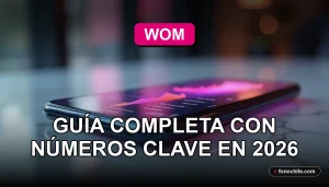 Un teléfono inteligente moderno con pantalla que muestra gráficos abstractos, descansando sobre una mesa de diseño minimalista, representando el servicio de buzón de voz de WOM.