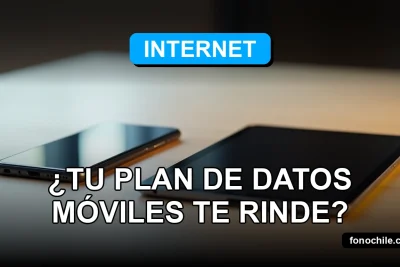 Calculadora de datos móviles mostrando gráficos abstractos de consumo en una tableta moderna sobre una mesa de madera clara.