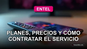 Moderno control remoto de Entel TV y un smartphone sobre una mesa de madera clara, mostrando gráficos abstractos en sus pantallas.