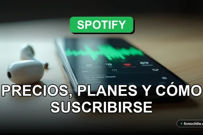 Un teléfono inteligente moderno descansa sobre una mesa de madera clara, su pantalla muestra gráficos abstractos de colores vibrantes sobre un fondo oscuro, junto a auriculares inalámbricos.