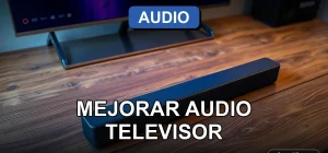 Mejorar el sonido de un televisor moderno con una barra de sonido en una mesa de madera